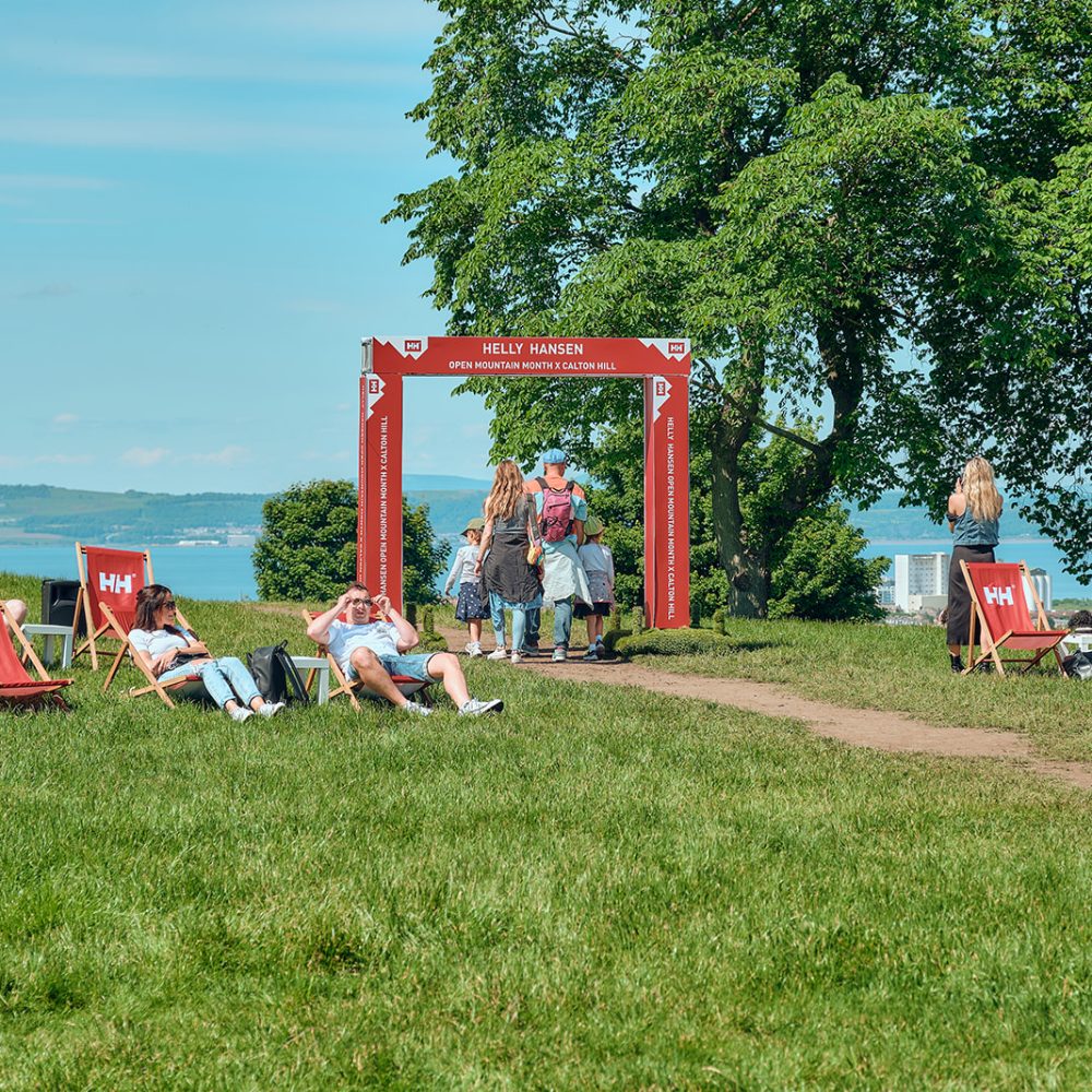 Landscape photograph of HH arch way with branded chairs